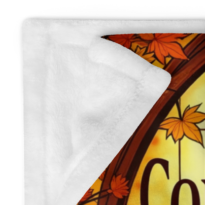 Velveteen blanket reading “Comfort, Cozy, and Calm,” relaxing fall self-care design in soft warm tones.