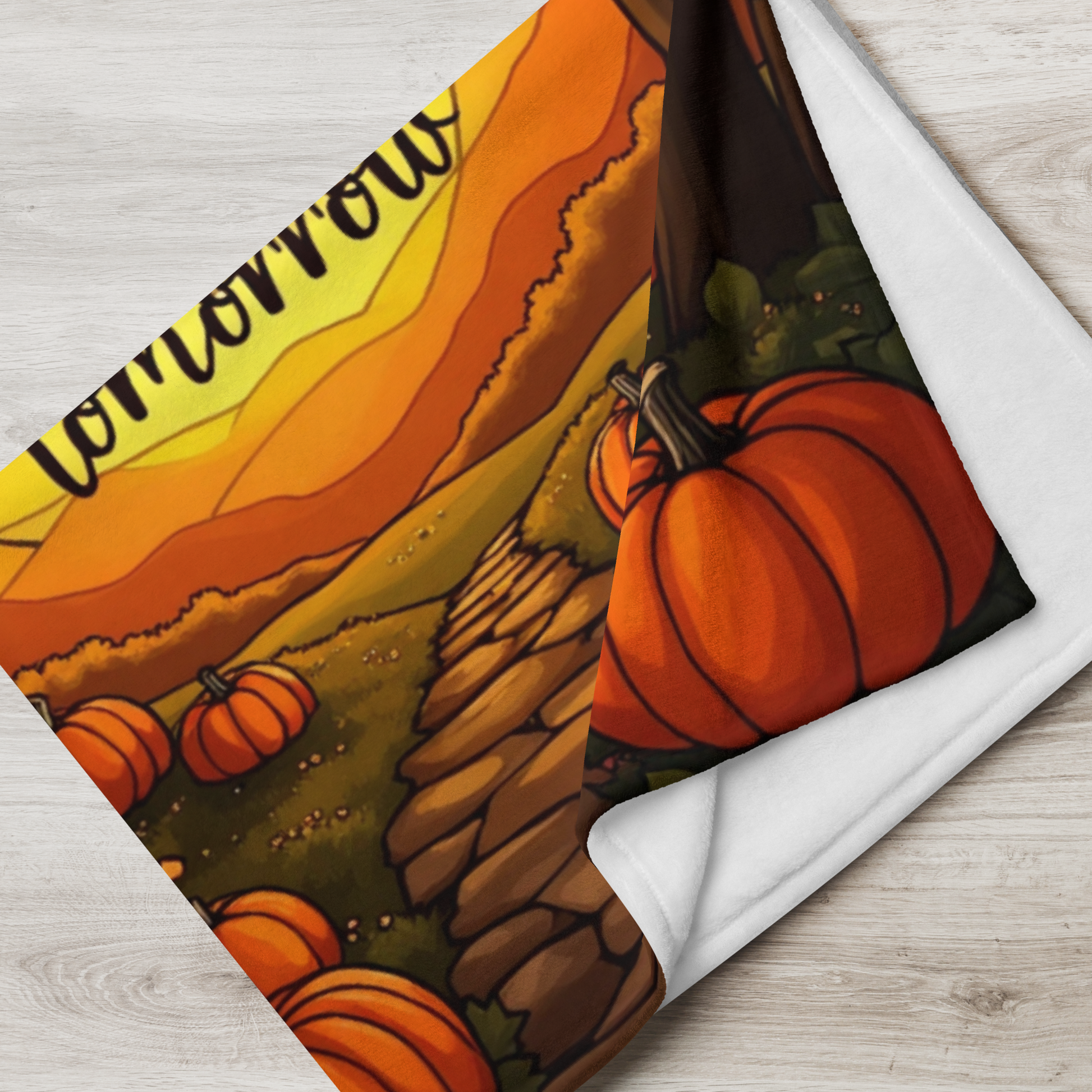 Motivational blanket with “Grateful Today, Stronger Tomorrow,” positive fall mindfulness message.