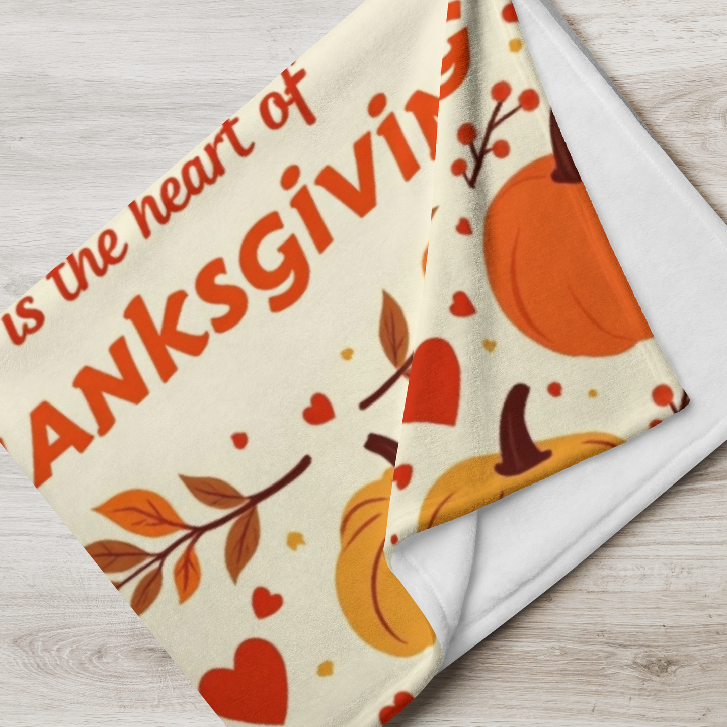 Thanksgiving blanket with “Gratitude Is the Heart of Thanksgiving,” cozy seasonal gratitude design.