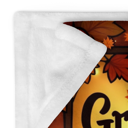 Mindful fall blanket with “Gratitude Is the Heart’s Favorite Practice,” warm calming tones and fall décor.