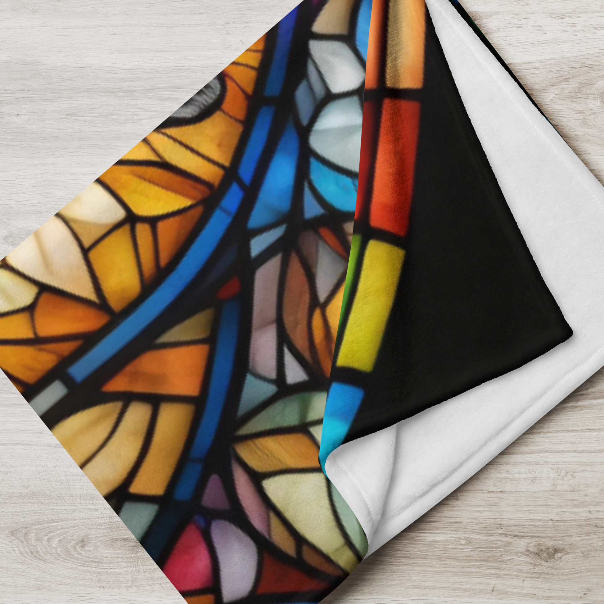 A playful meerkat blanket featuring stained glass-inspired art and cozy plush warmth.