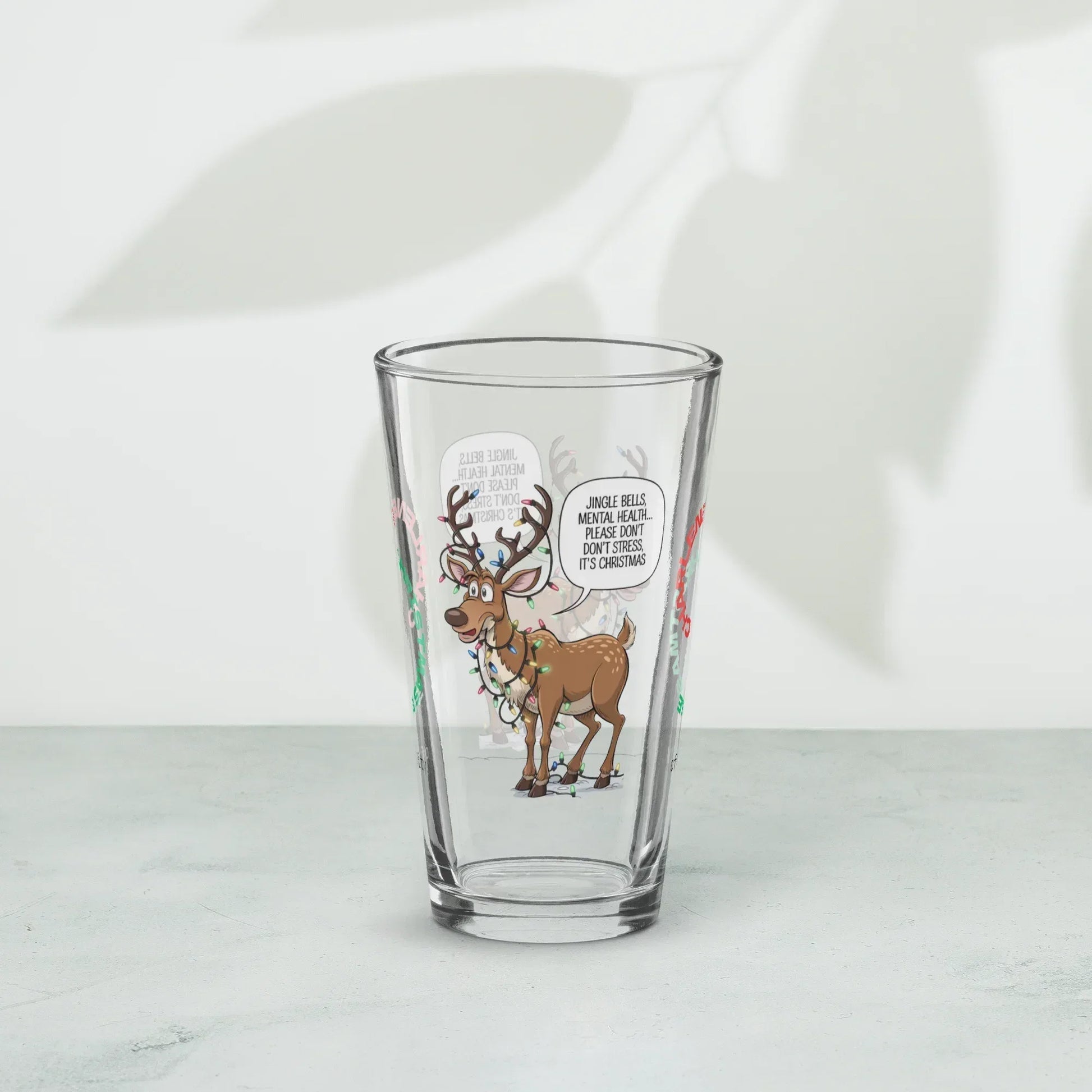 Shop our premium jingle bells mental health christmas pint glass from MySisterIsASurvivor.