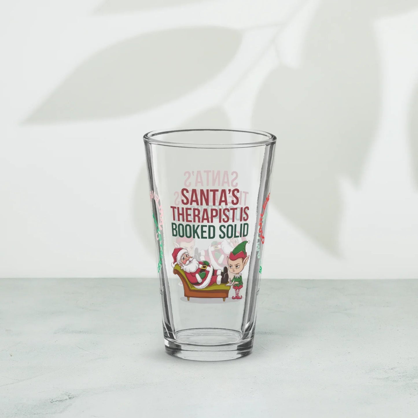 Shop our premium santas therapist is booked solid christmas pint glass 1 from MySisterIsASurvivor.