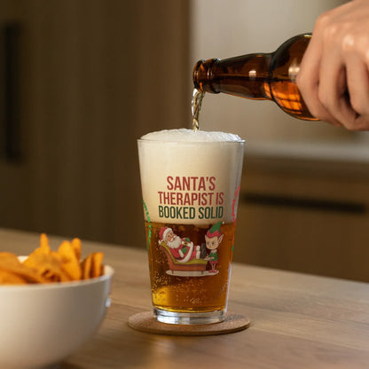 Shop our premium santas therapist is booked solid christmas pint glass 1 from MySisterIsASurvivor.