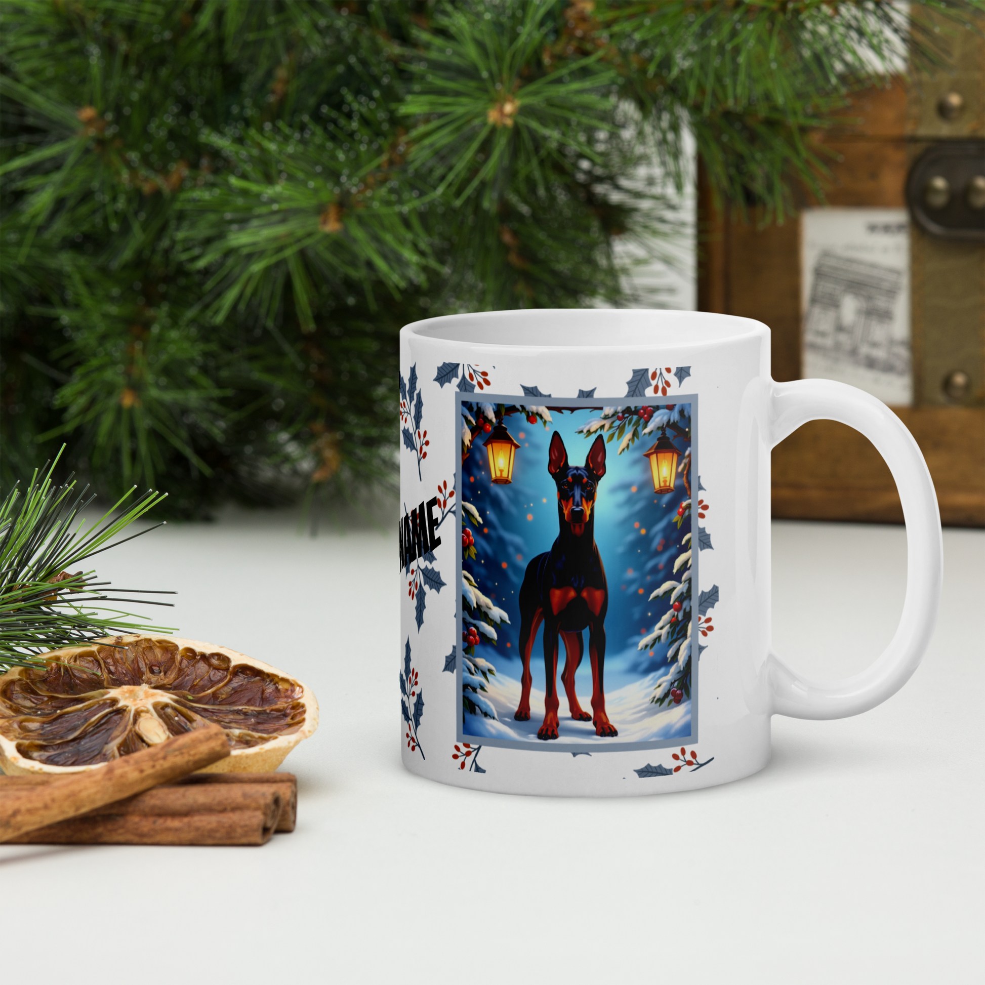 Doberman (Black & Rust) Winter Mug - black and rust Doberman illustrated standing proudly in a snowy winter scene with pine branches