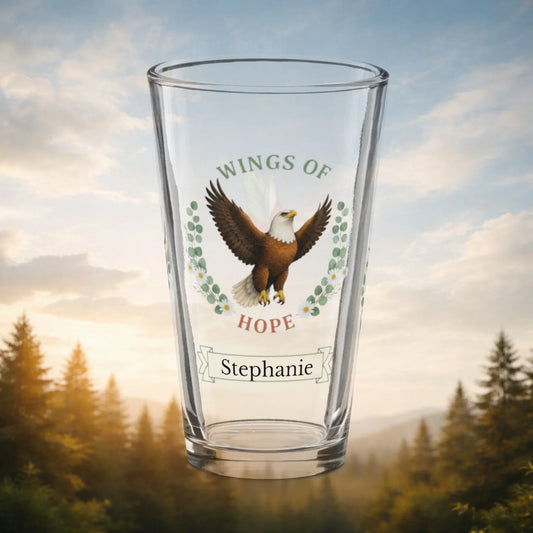 Shop our premium wings of hope eagle pint glass from MySisterIsASurvivor.