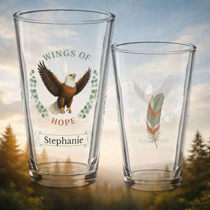 Shop our wings of hope eagle pint glass featuring the 16oz style option from MySisterIsASurvivor.