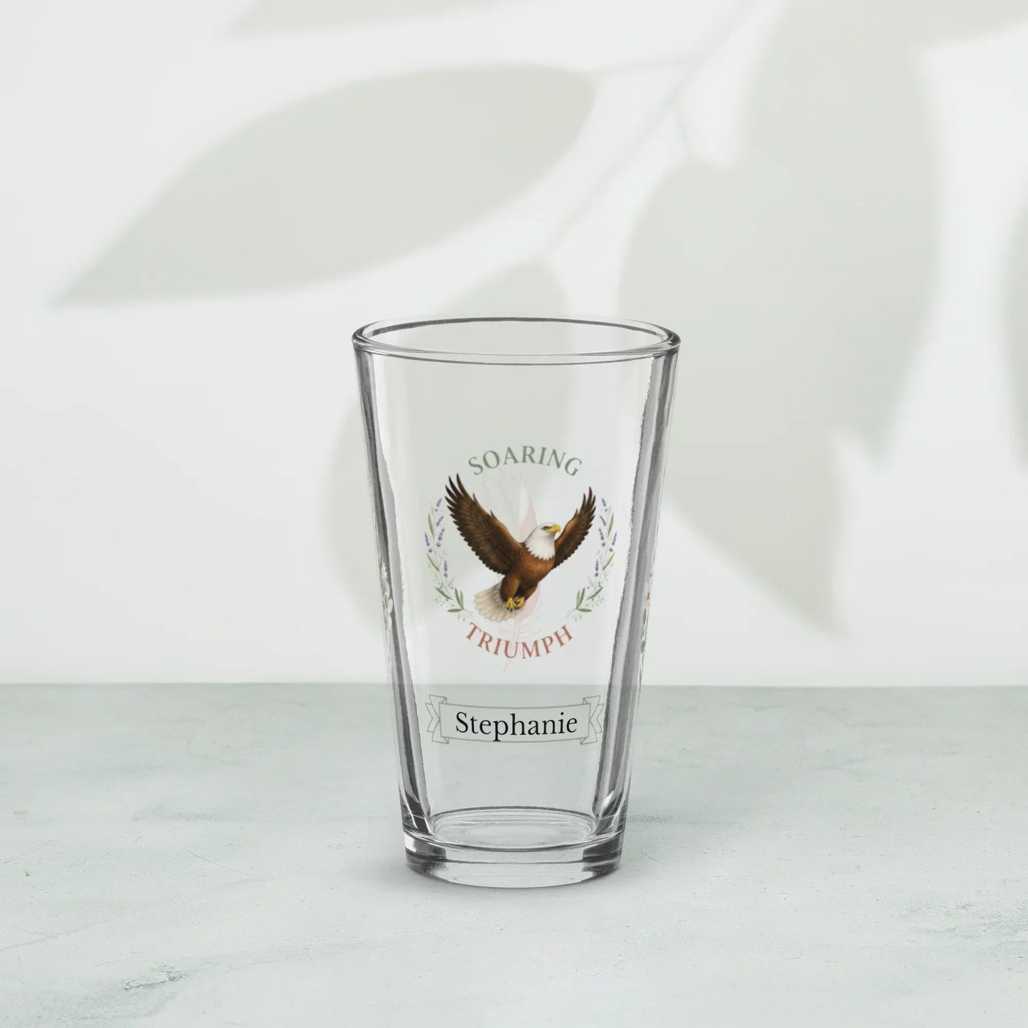 Shop our premium soaring triumph eagle pint glass from MySisterIsASurvivor.