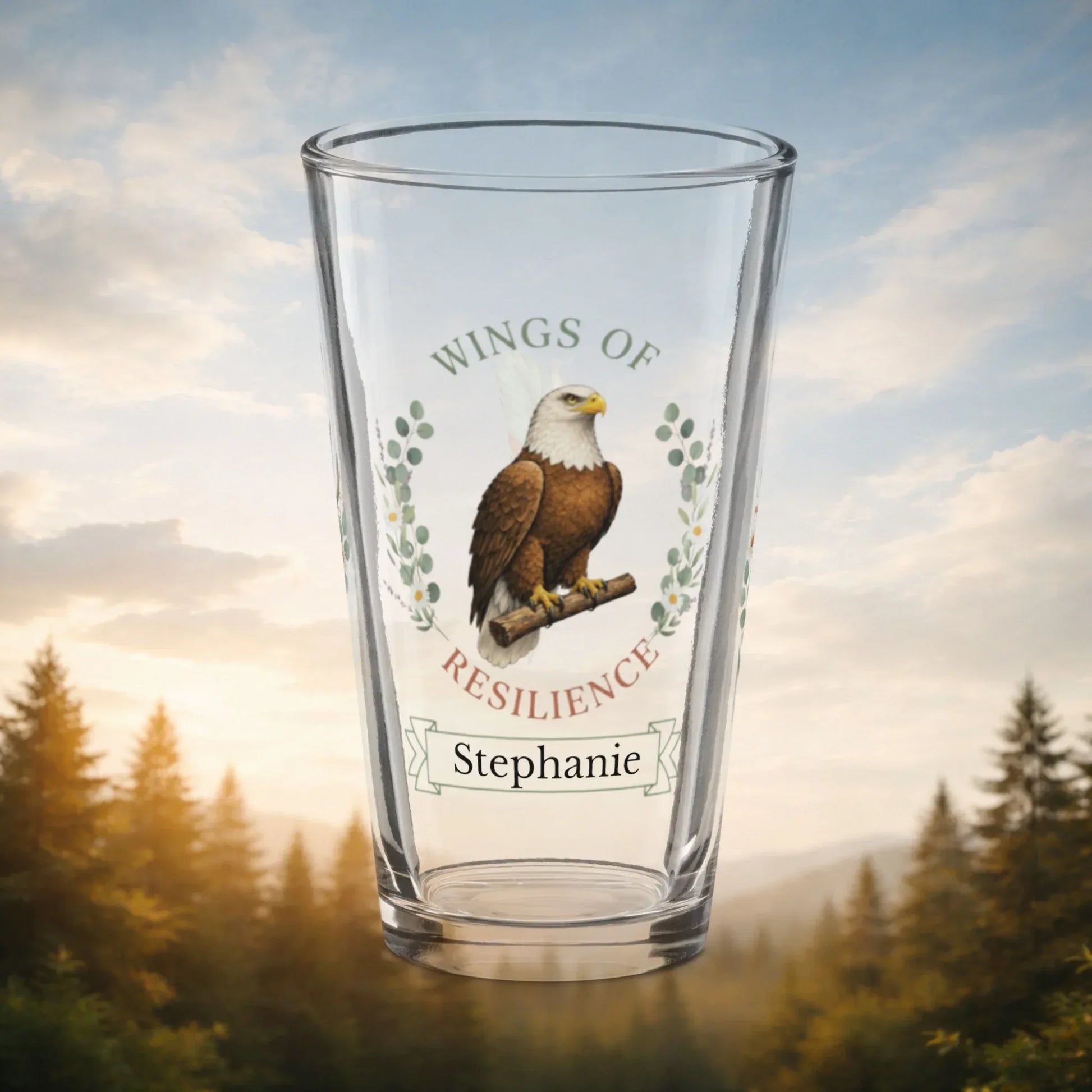 Shop our premium wings of resilience eagle pint glass from MySisterIsASurvivor.
