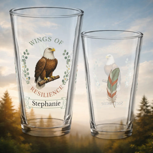 Shop our wings of resilience eagle pint glass featuring the 16oz style option from MySisterIsASurvivor.