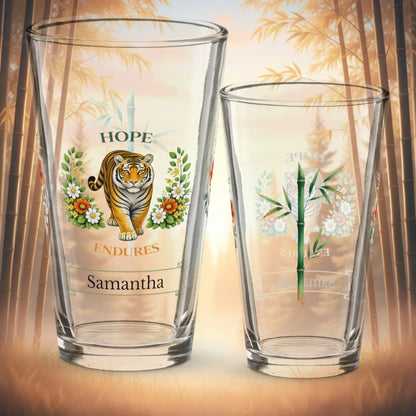 Shop our hope endures tiger pint glass featuring the 16oz style option from MySisterIsASurvivor.