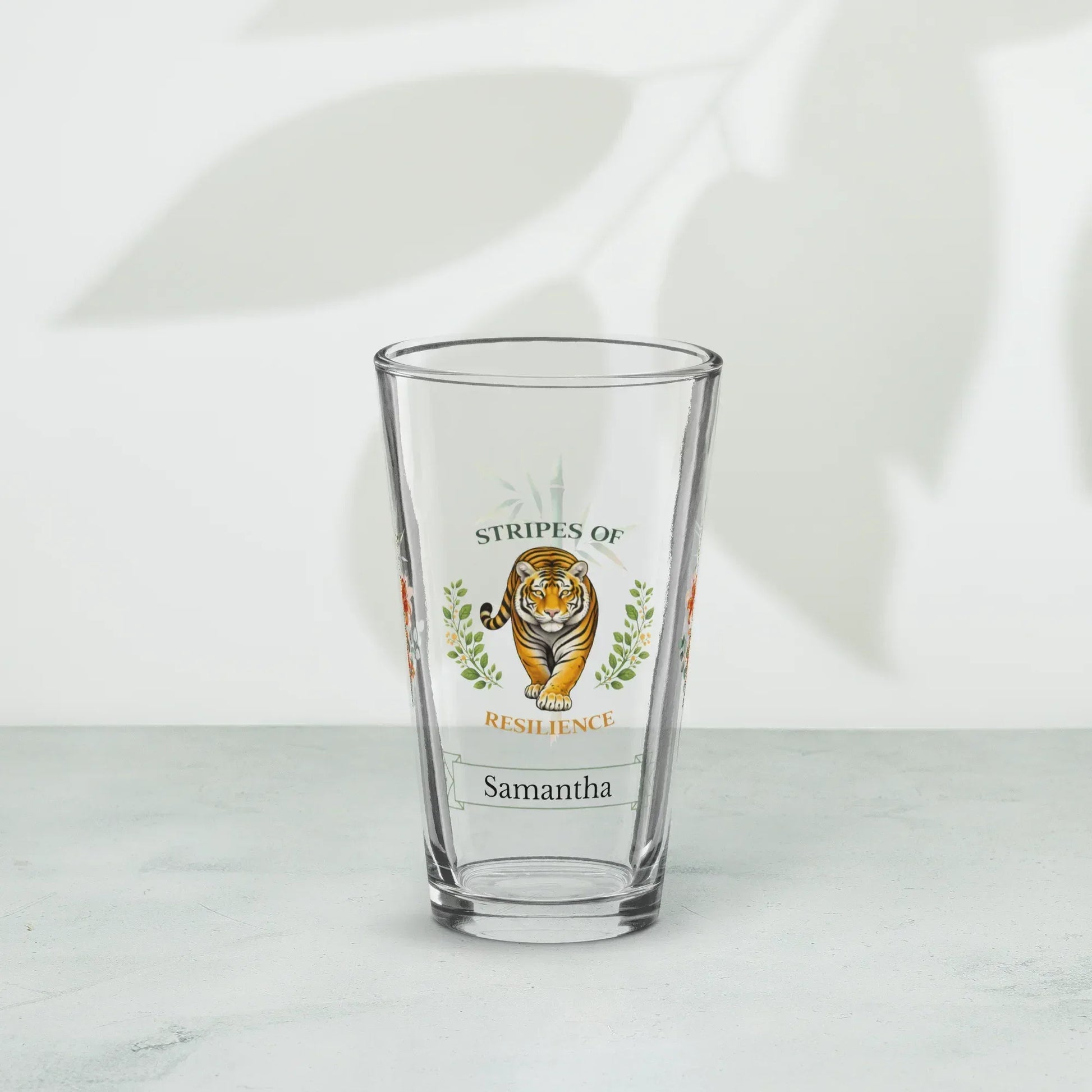 Shop our premium stripes of resilience tiger pint glass from MySisterIsASurvivor.