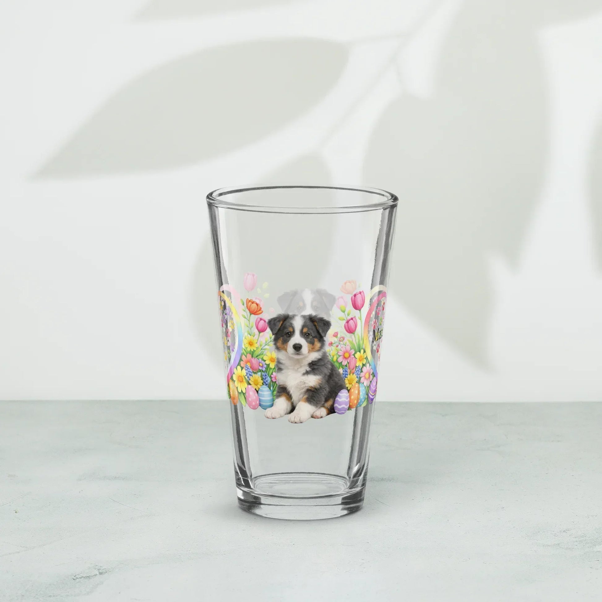 Shop our premium border collie blue tricolor easter puppy pint glass from MySisterIsASurvivor.