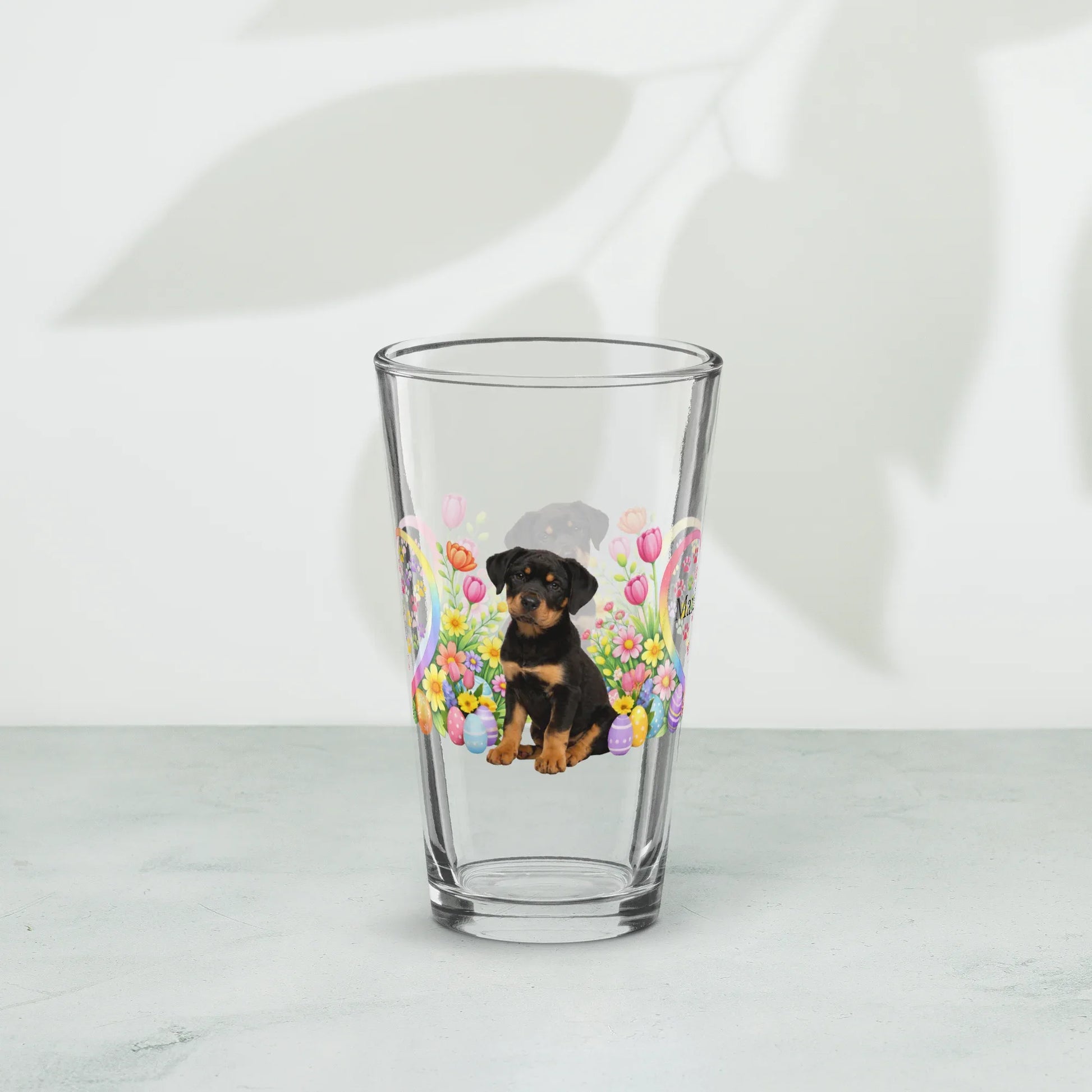 Shop our premium rottweiler black mahogany easter puppy pint glass from MySisterIsASurvivor.