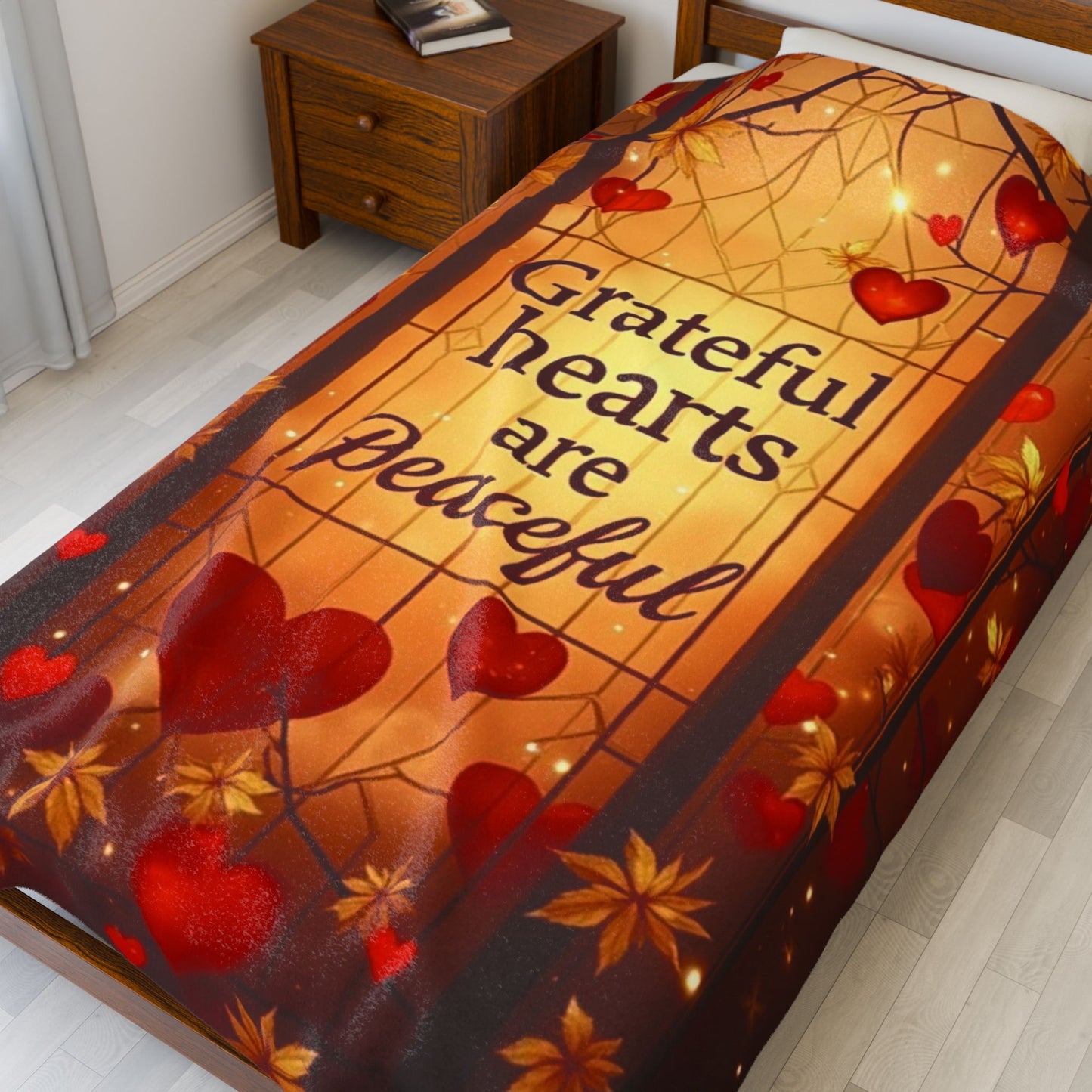 Warm blanket with “Grateful Hearts Are Peaceful,” Thanksgiving gratitude design in soft autumn hues.