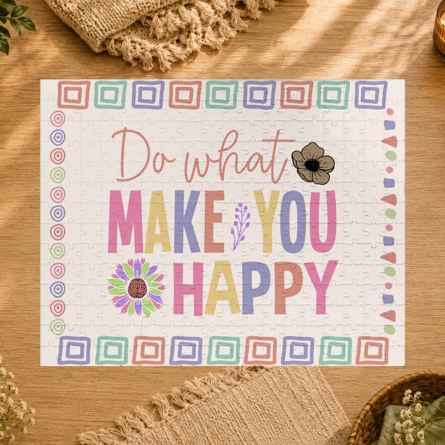 Motivational mat with colorful text and floral designs on a white background