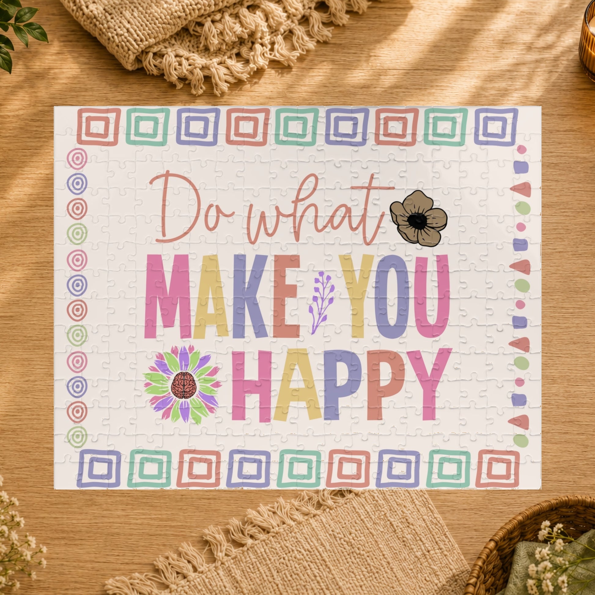 Motivational mat with colorful text and floral designs on a white background