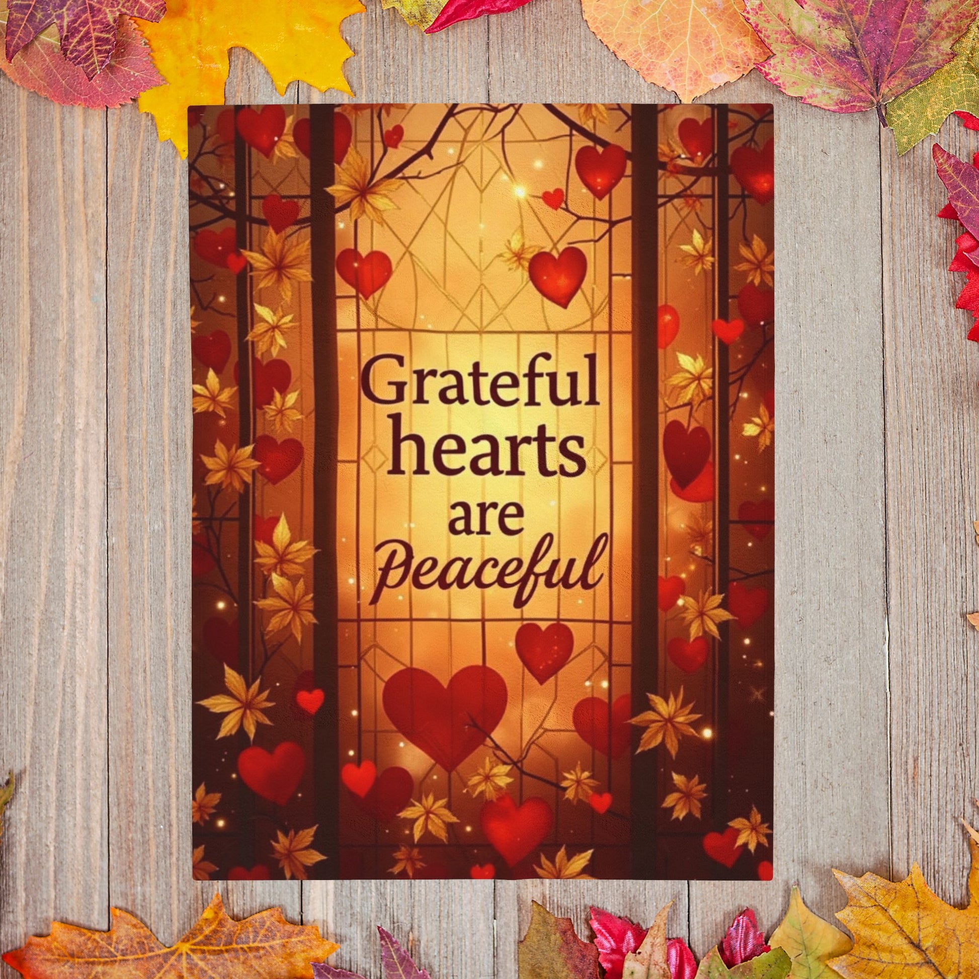 Warm blanket with “Grateful Hearts Are Peaceful,” Thanksgiving gratitude design in soft autumn hues.