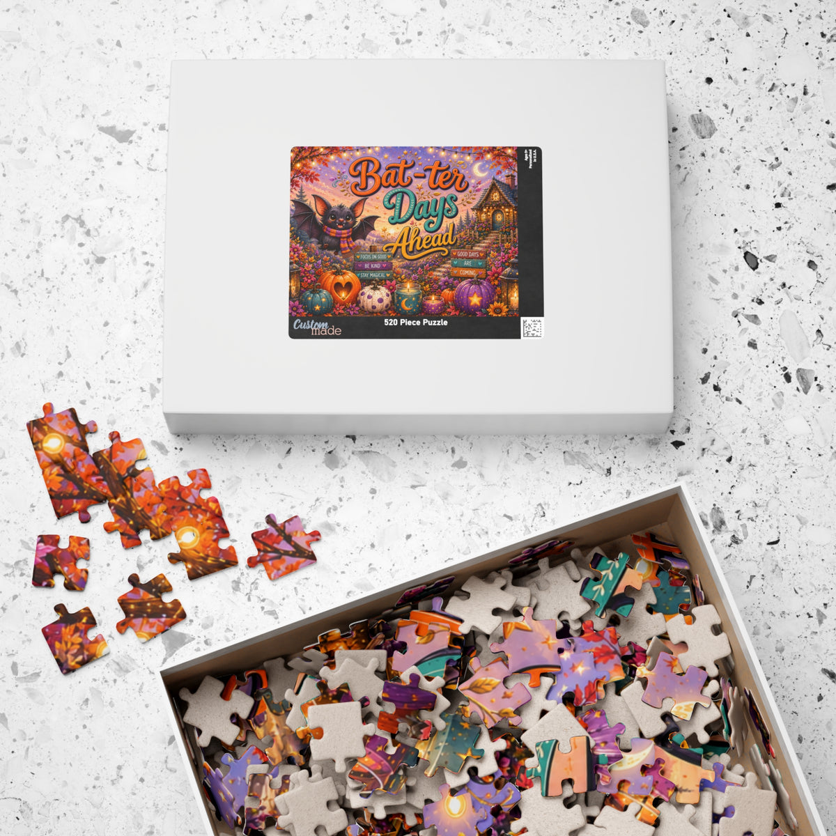 Bat-ter Days Ahead Halloween puzzle featuring cheerful bat artwork, heart pumpkins, and a cozy cottage scene