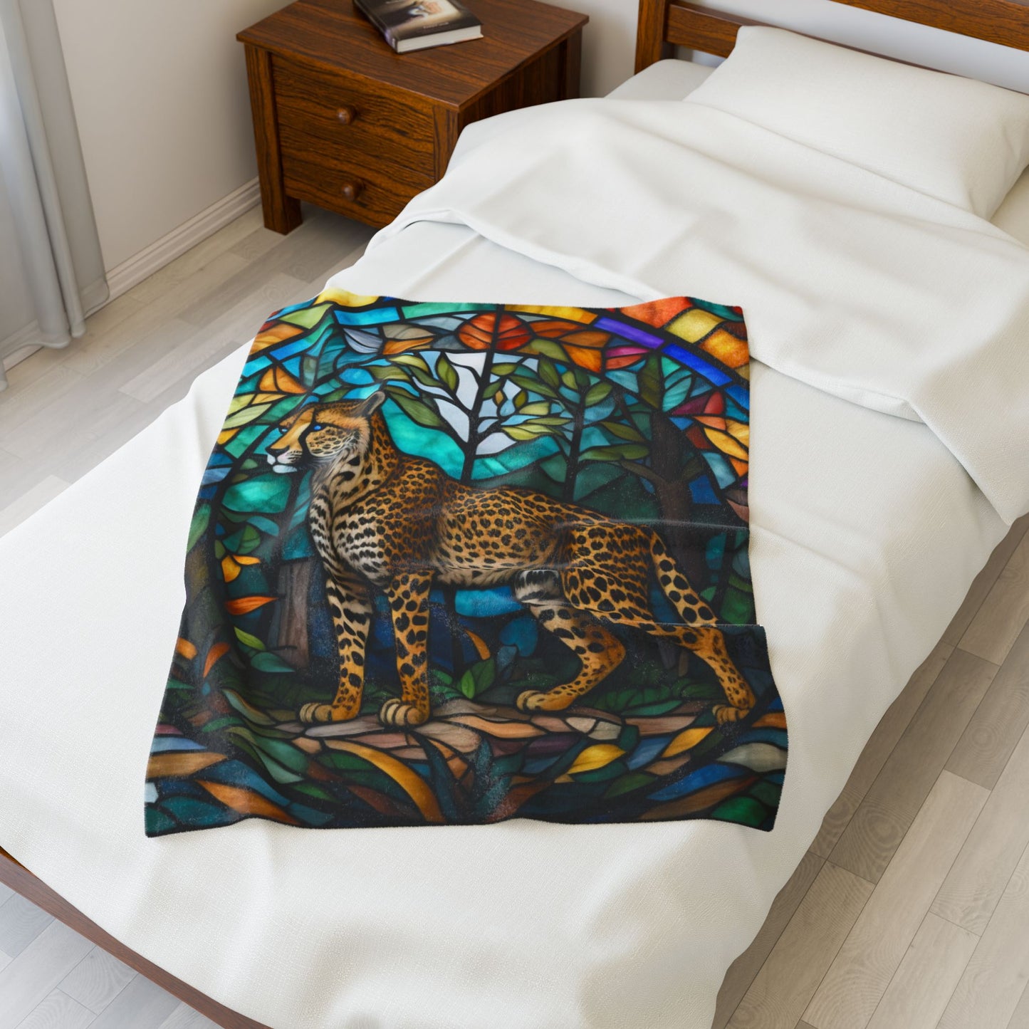 A soft cheetah blanket with stained glass-inspired artwork that adds wild beauty to any space.