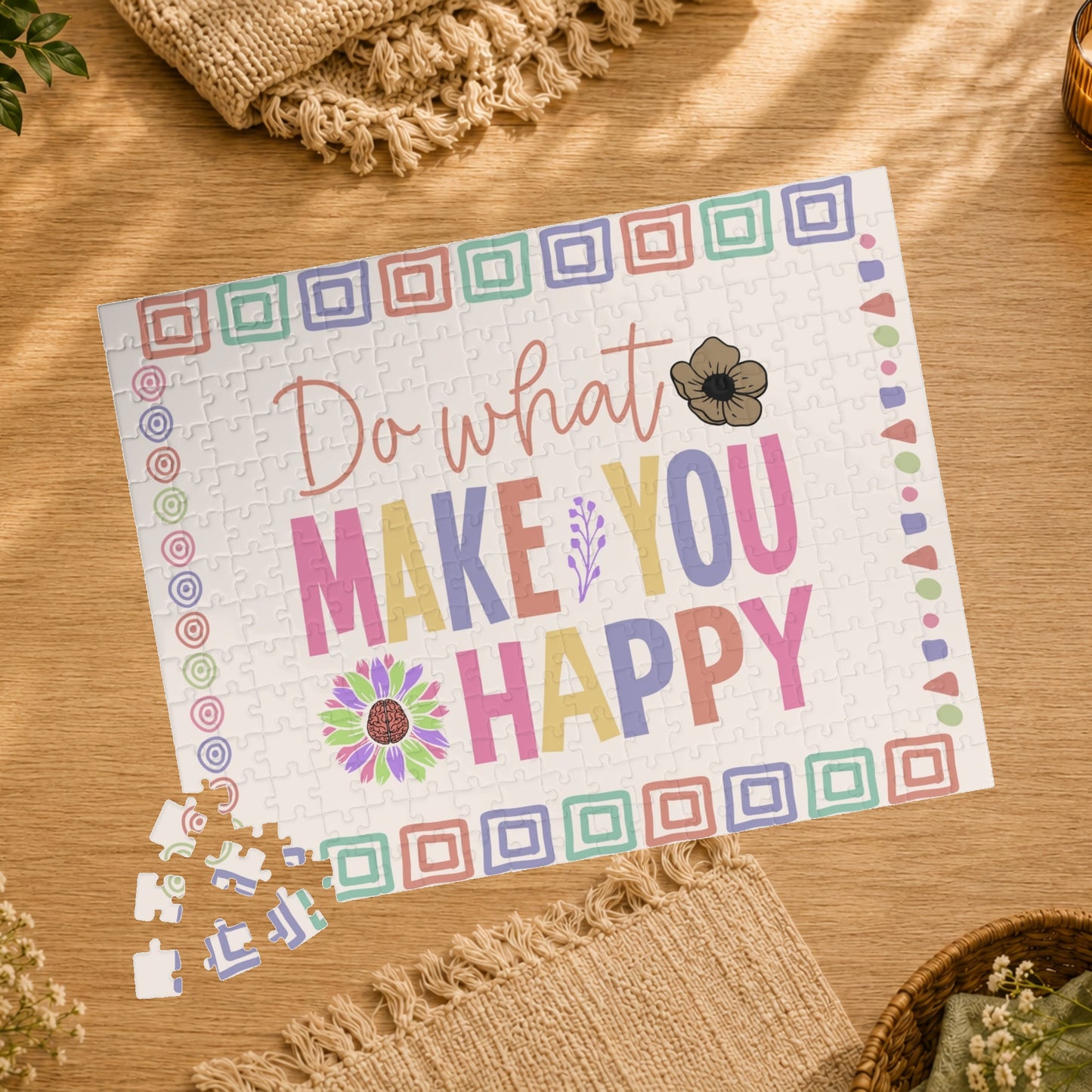 Puzzle with colorful text 'Do what makes you happy' and a flower design on a white background.