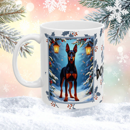 Doberman (Black & Rust) Winter Mug - black and rust Doberman illustrated standing proudly in a snowy winter scene with pine branches