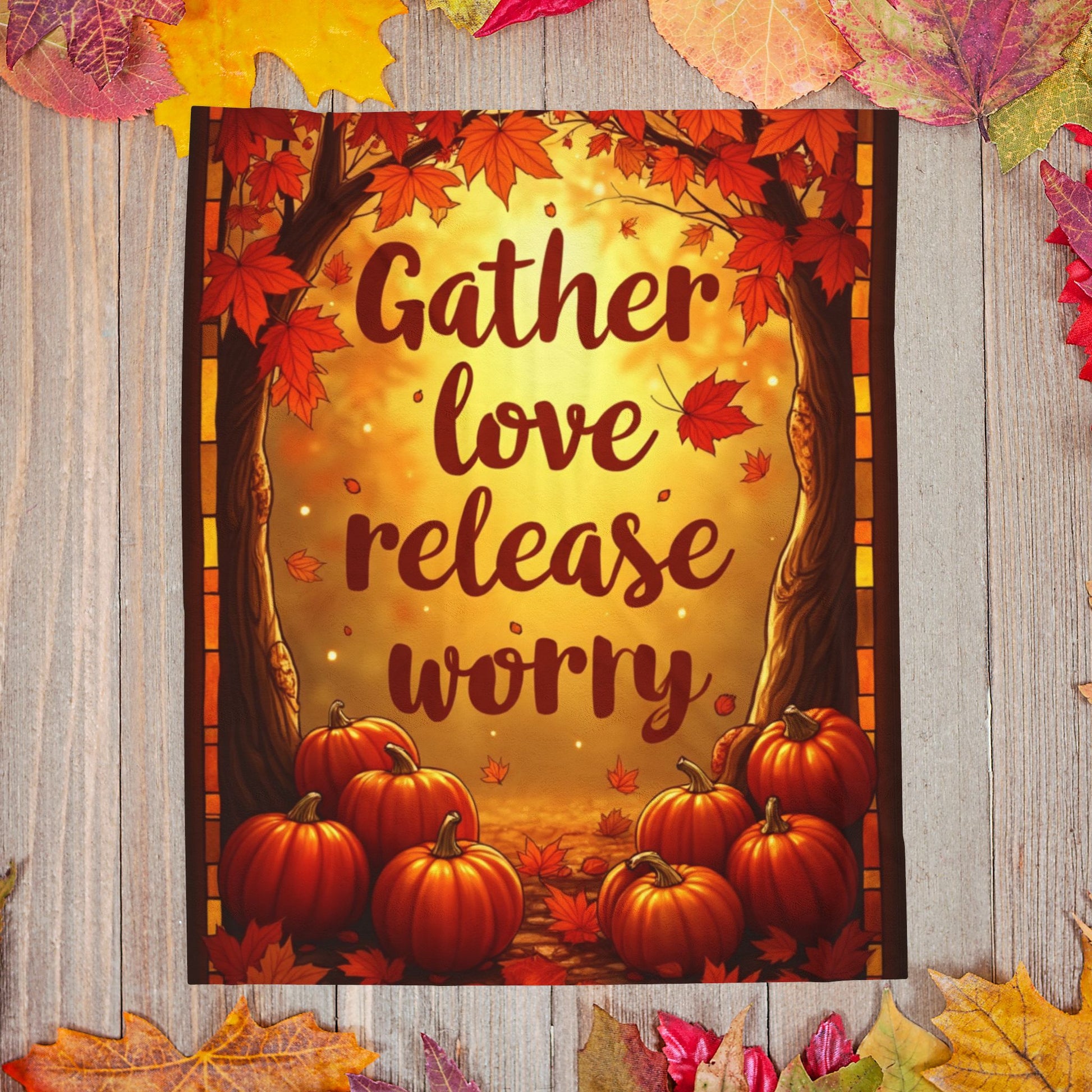 Cozy blanket with “Gather Love, Release Worry,” peaceful fall-themed design promoting calm and gratitude.