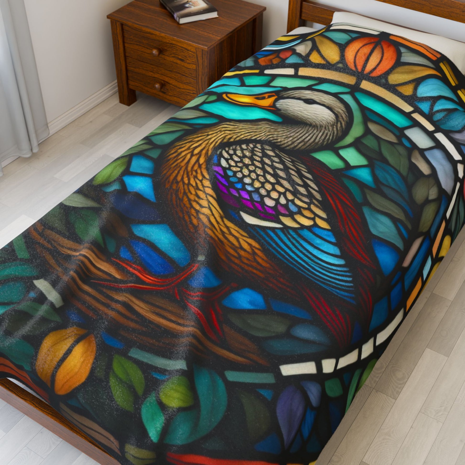 A stained glass duck blanket that brings bright wildlife charm and soft comfort to your home.