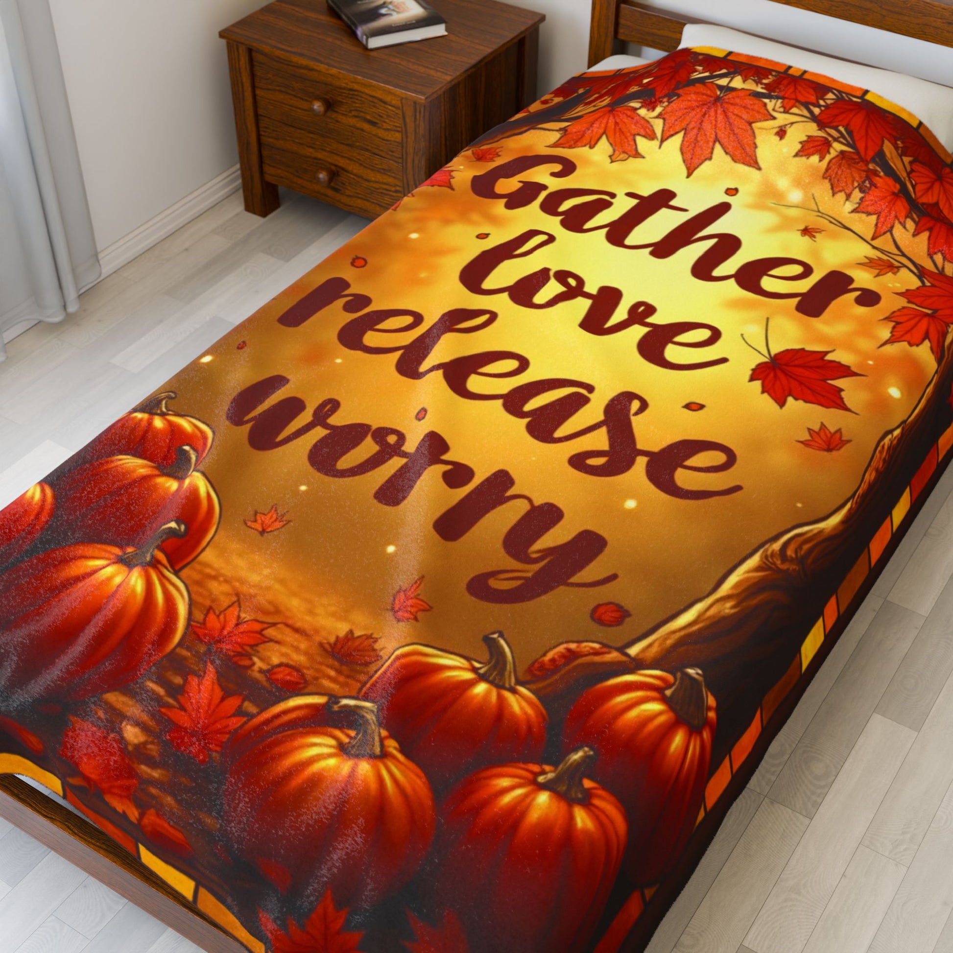 Cozy blanket with “Gather Love, Release Worry,” peaceful fall-themed design promoting calm and gratitude.