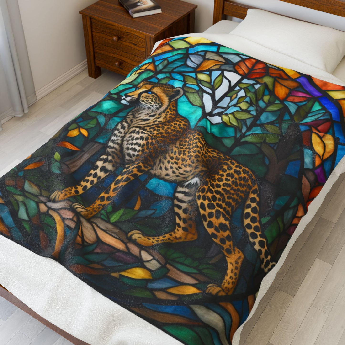 A soft cheetah blanket with stained glass-inspired artwork that adds wild beauty to any space.