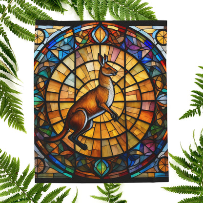 A cozy kangaroo blanket with stained glass-style background that radiates warmth and calm.