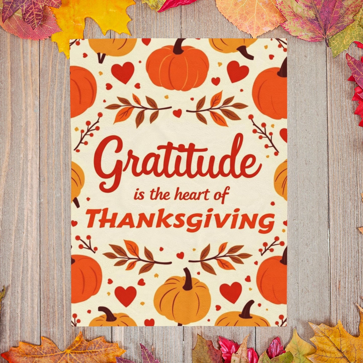 Thanksgiving blanket with “Gratitude Is the Heart of Thanksgiving,” cozy seasonal gratitude design.