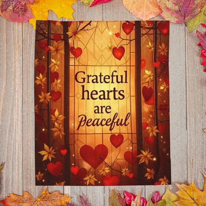 Warm blanket with “Grateful Hearts Are Peaceful,” Thanksgiving gratitude design in soft autumn hues.