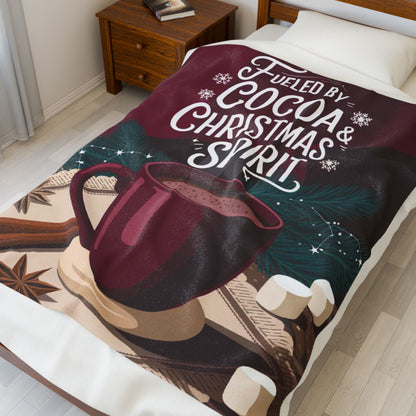 Holiday blanket “Fueled by Cocoa & Christmas Spirit” cozy Christmas throw for warmth and fun