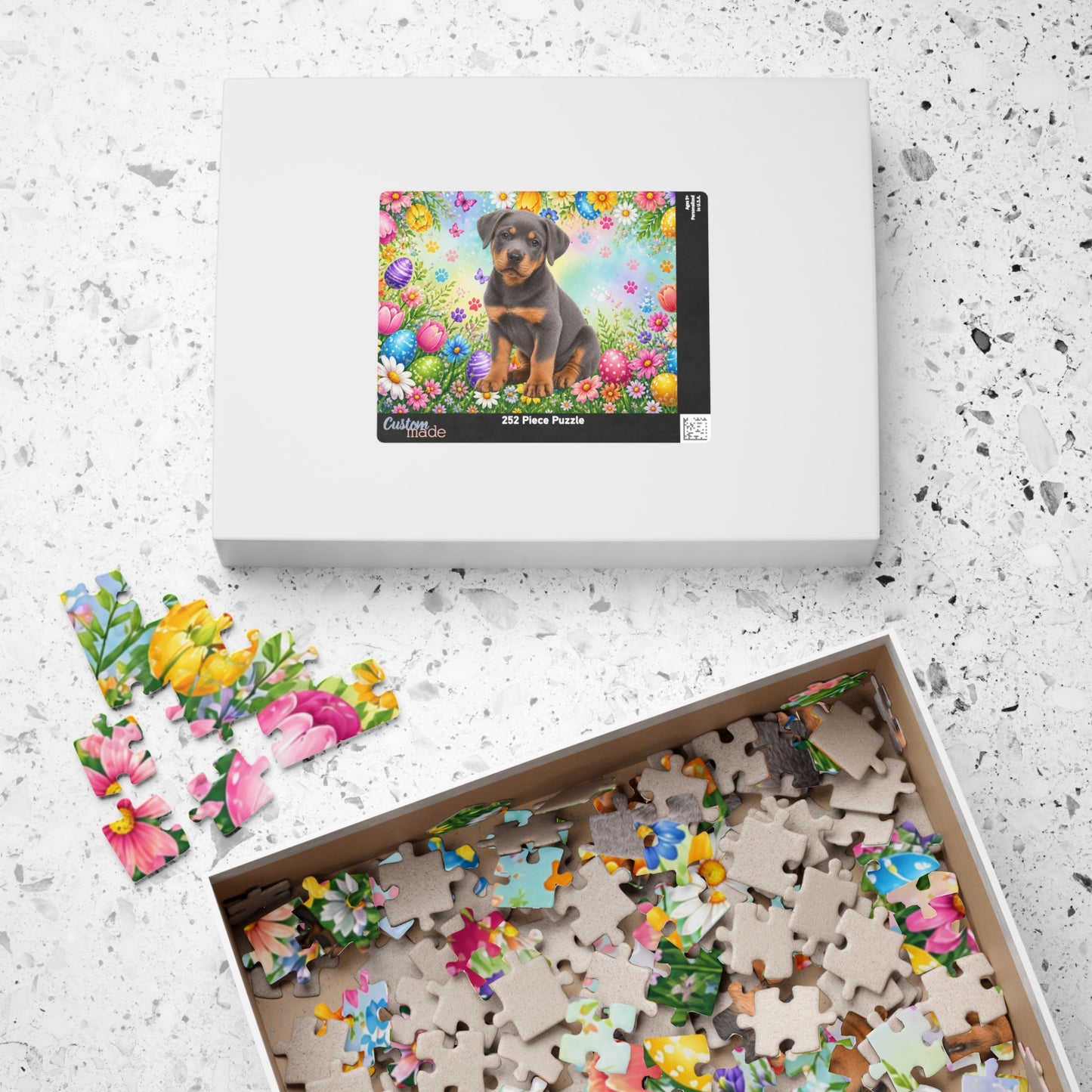 Rottweiler (Blue) Easter Puppy Puzzle - Spring Garden with Eggs, Tulips, and Butterflies