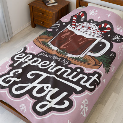 Christmas blanket “Powered by Peppermint & Joy” cozy holiday throw for festive relaxation and fun