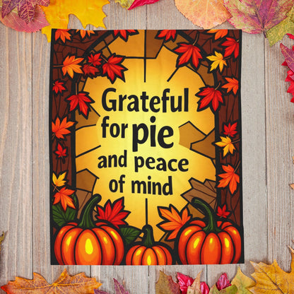 Thanksgiving blanket with “Grateful for Pie and Peace of Mind,” cheerful fall colors and cozy pie art.