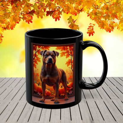 Chocolate and tan Rottweiler dog in fall leaves on a custom black mug.