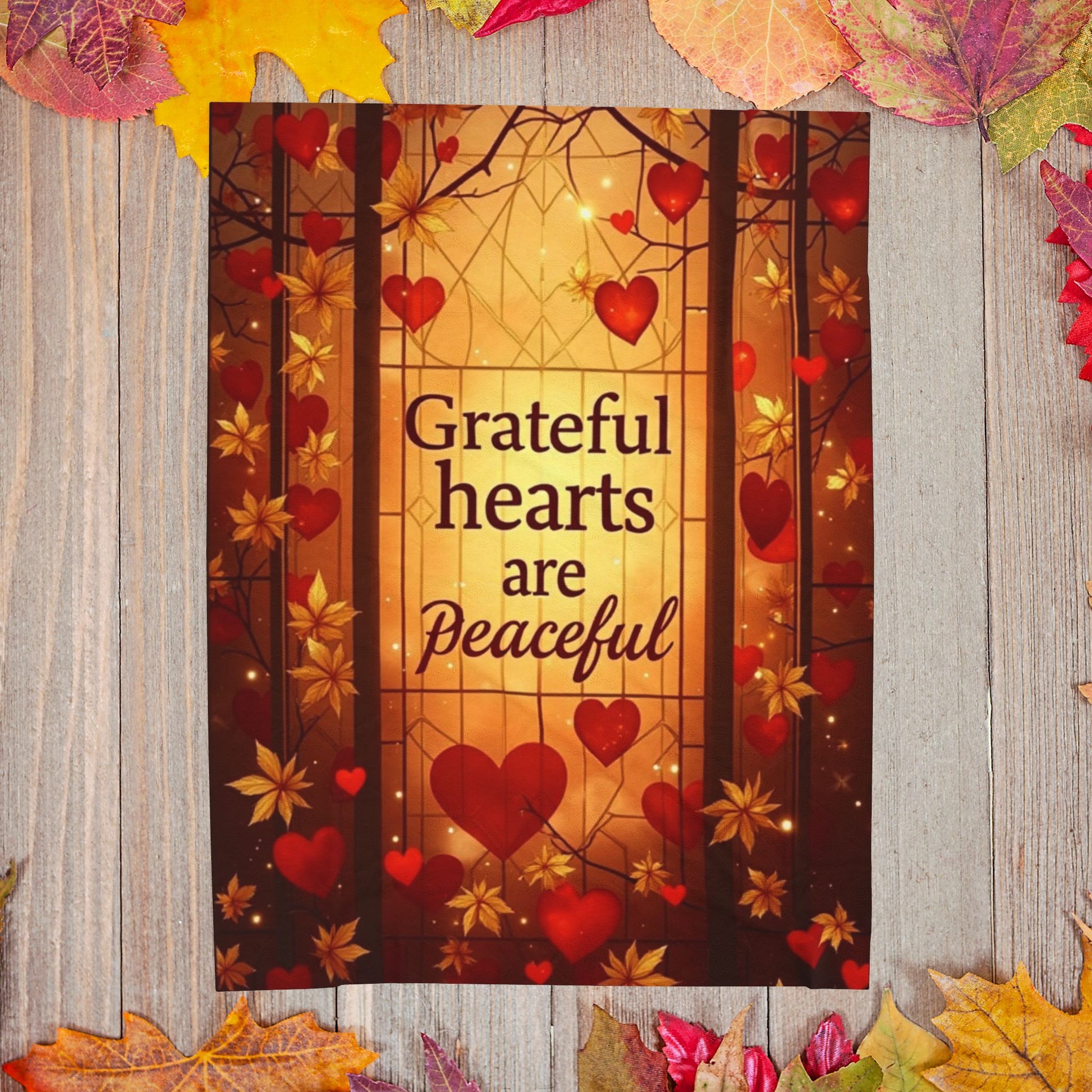 Warm blanket with “Grateful Hearts Are Peaceful,” Thanksgiving gratitude design in soft autumn hues.