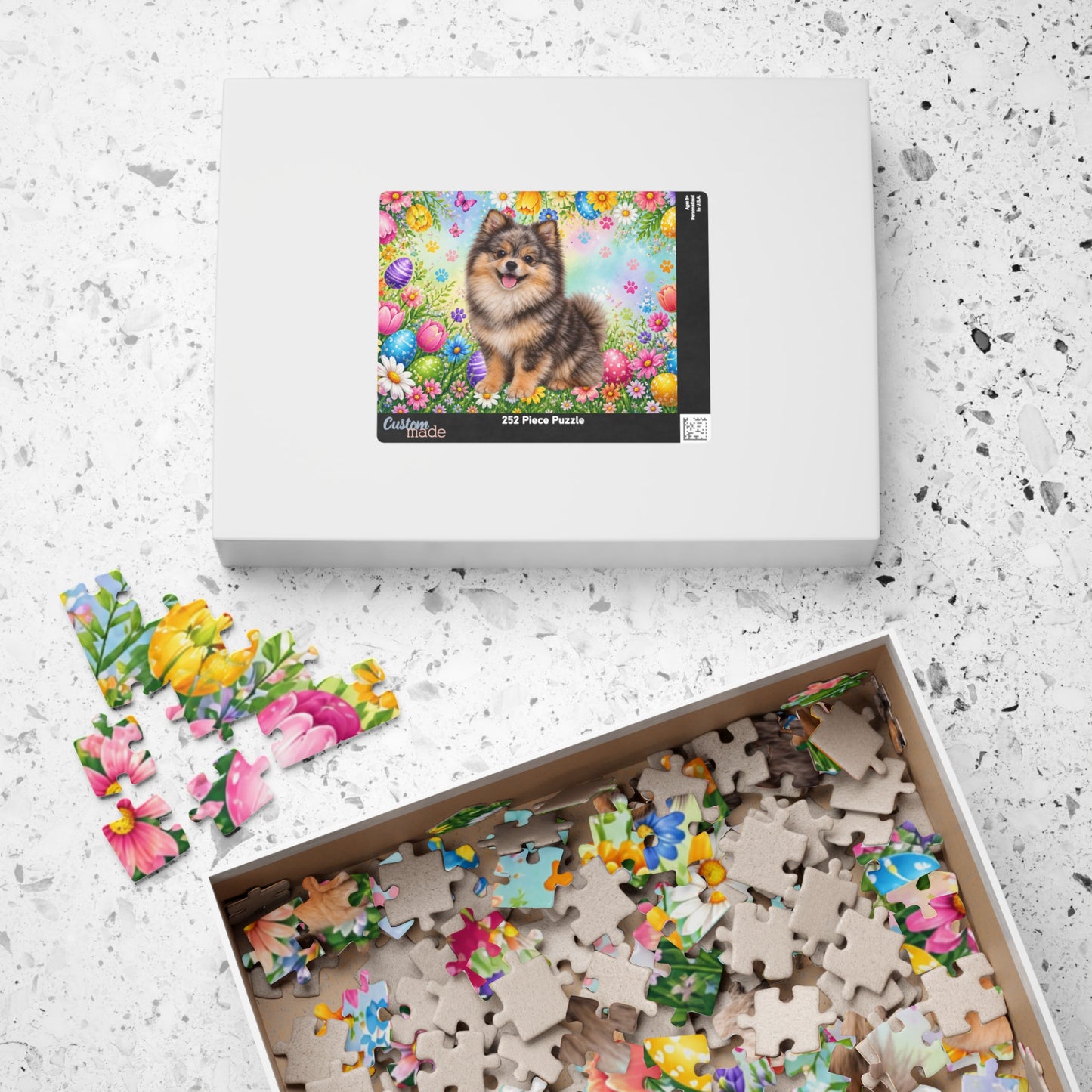 Pomeranian (Chocolate Merle) Easter Puppy Puzzle - Spring Garden with Eggs, Tulips, and Daisies