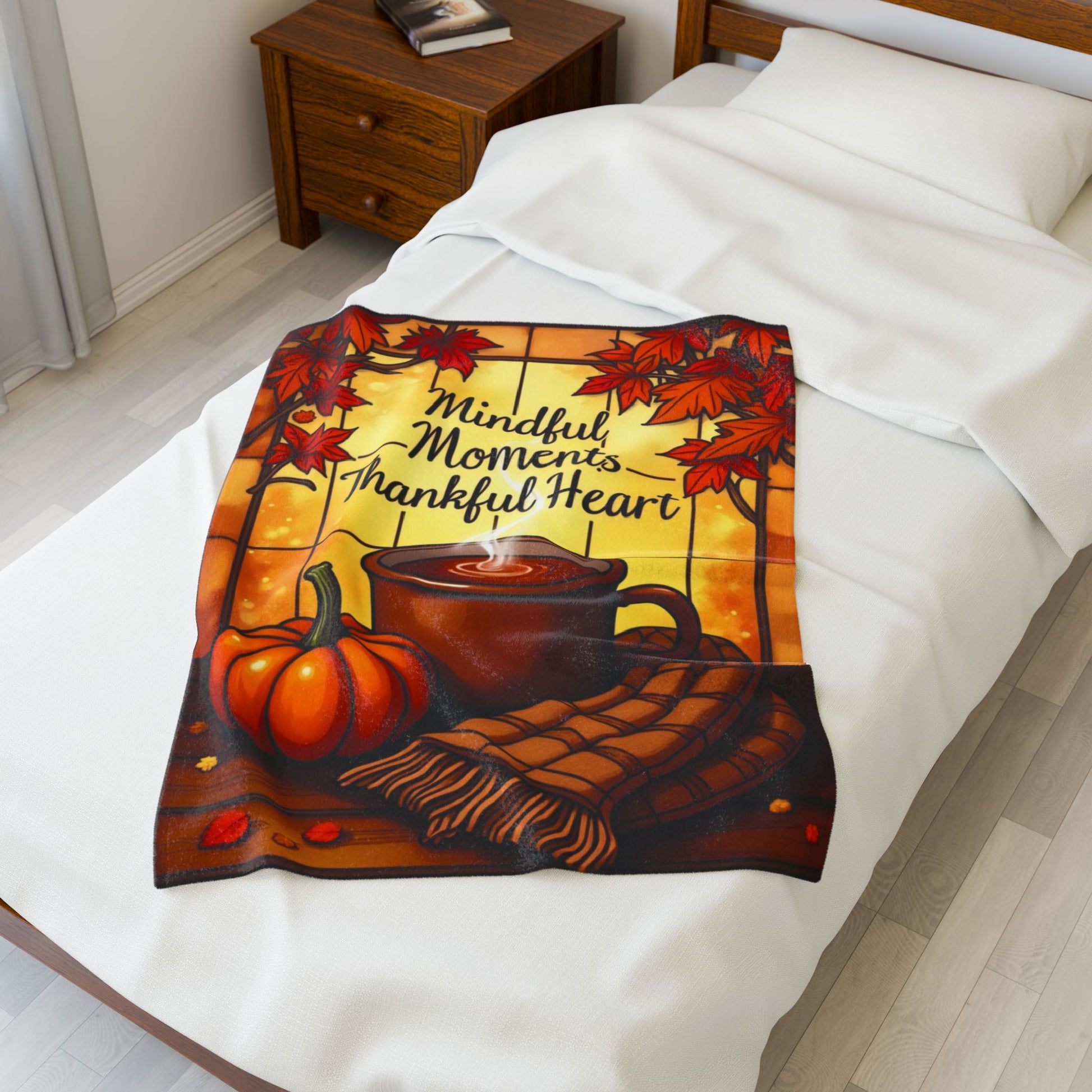 Cozy blanket with “Mindful Moments, Thankful Heart,” autumn mindfulness theme in warm orange and red.