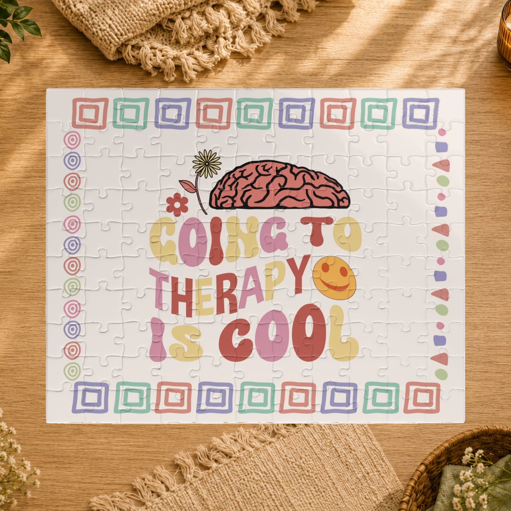 Jigsaw puzzle with colorful design and text 'Going to therapy is cool' on a white background
