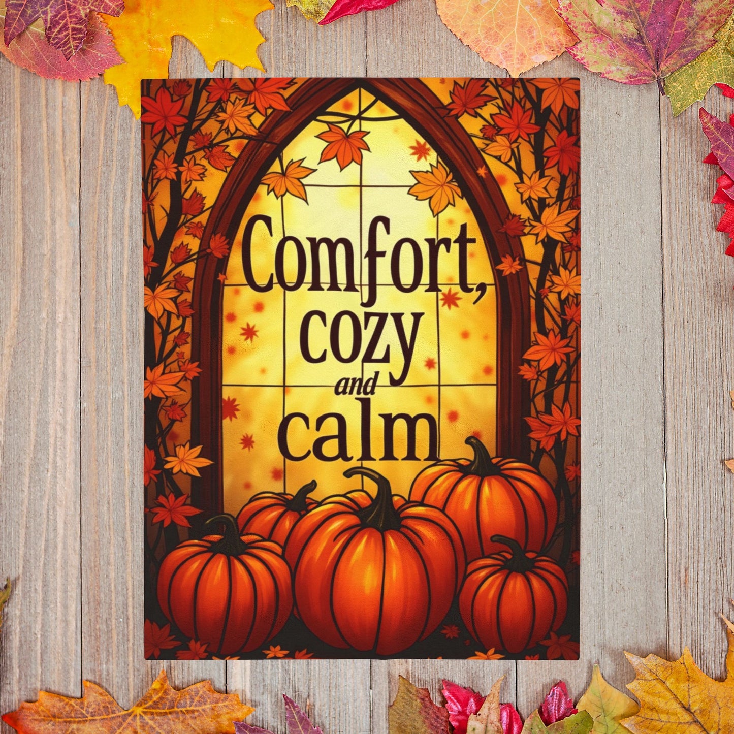 Velveteen blanket reading “Comfort, Cozy, and Calm,” relaxing fall self-care design in soft warm tones.
