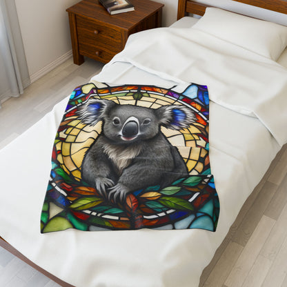A cute koala blanket with stained glass-style art, perfect for cozy comfort and self-care.