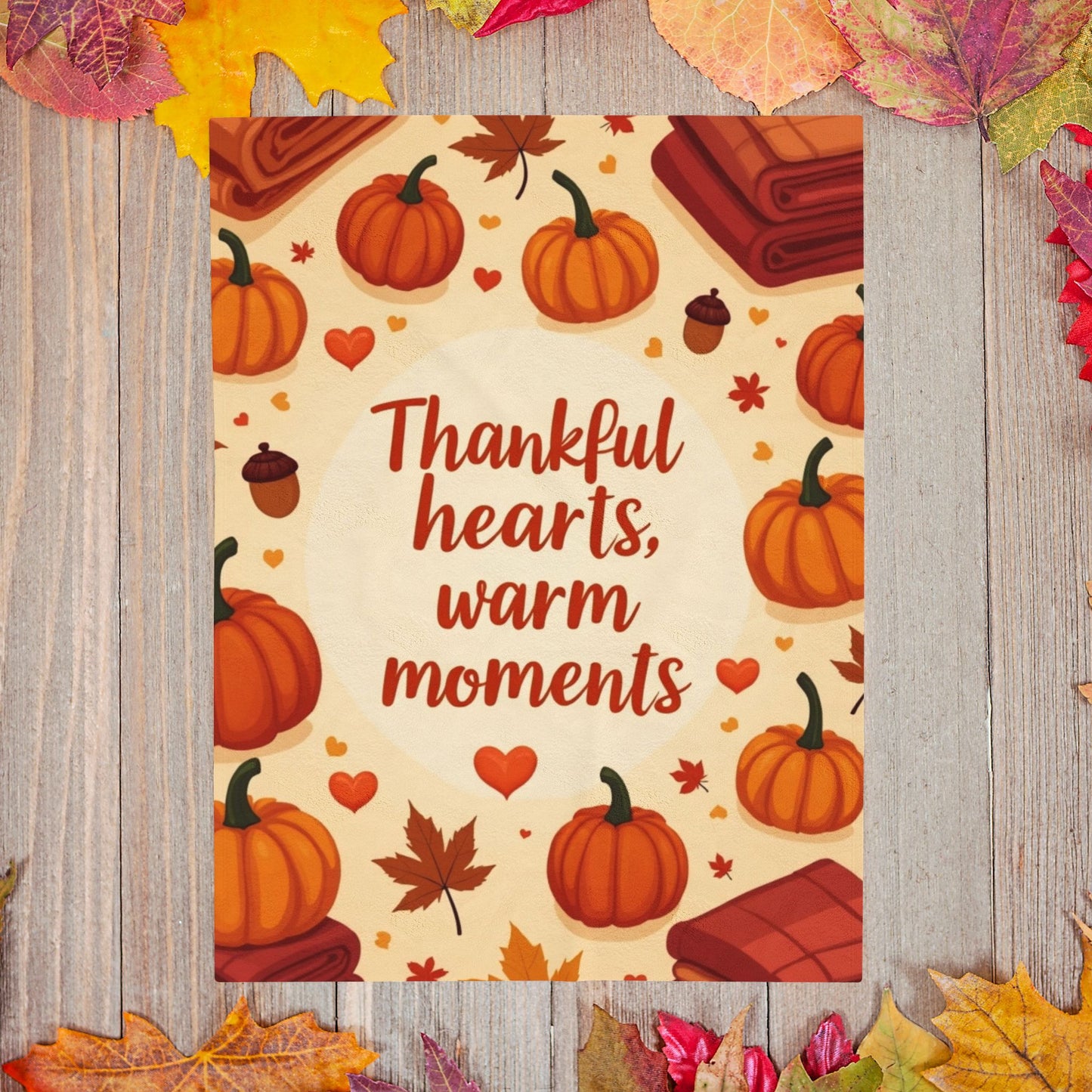 Thanksgiving blanket reading “Thankful Hearts, Warm Moments,” cozy autumn gratitude design.