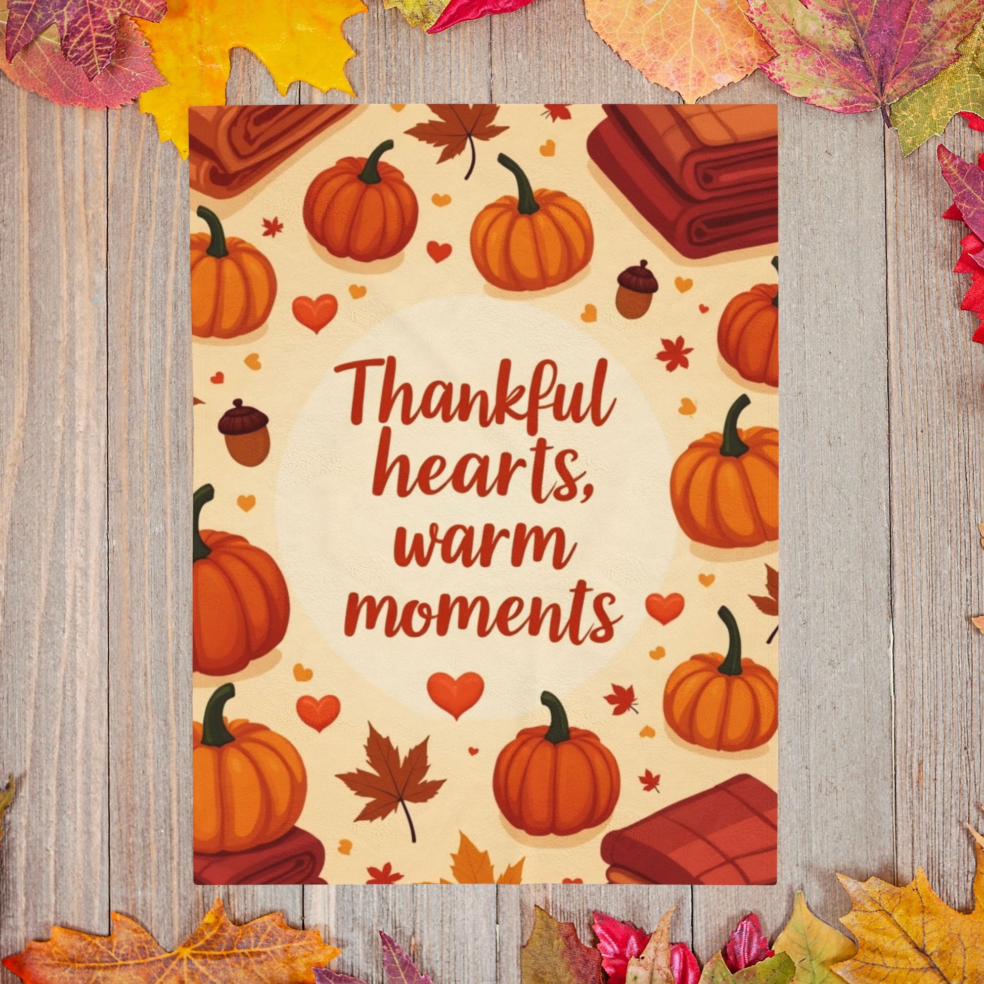 Thanksgiving blanket reading “Thankful Hearts, Warm Moments,” cozy autumn gratitude design.