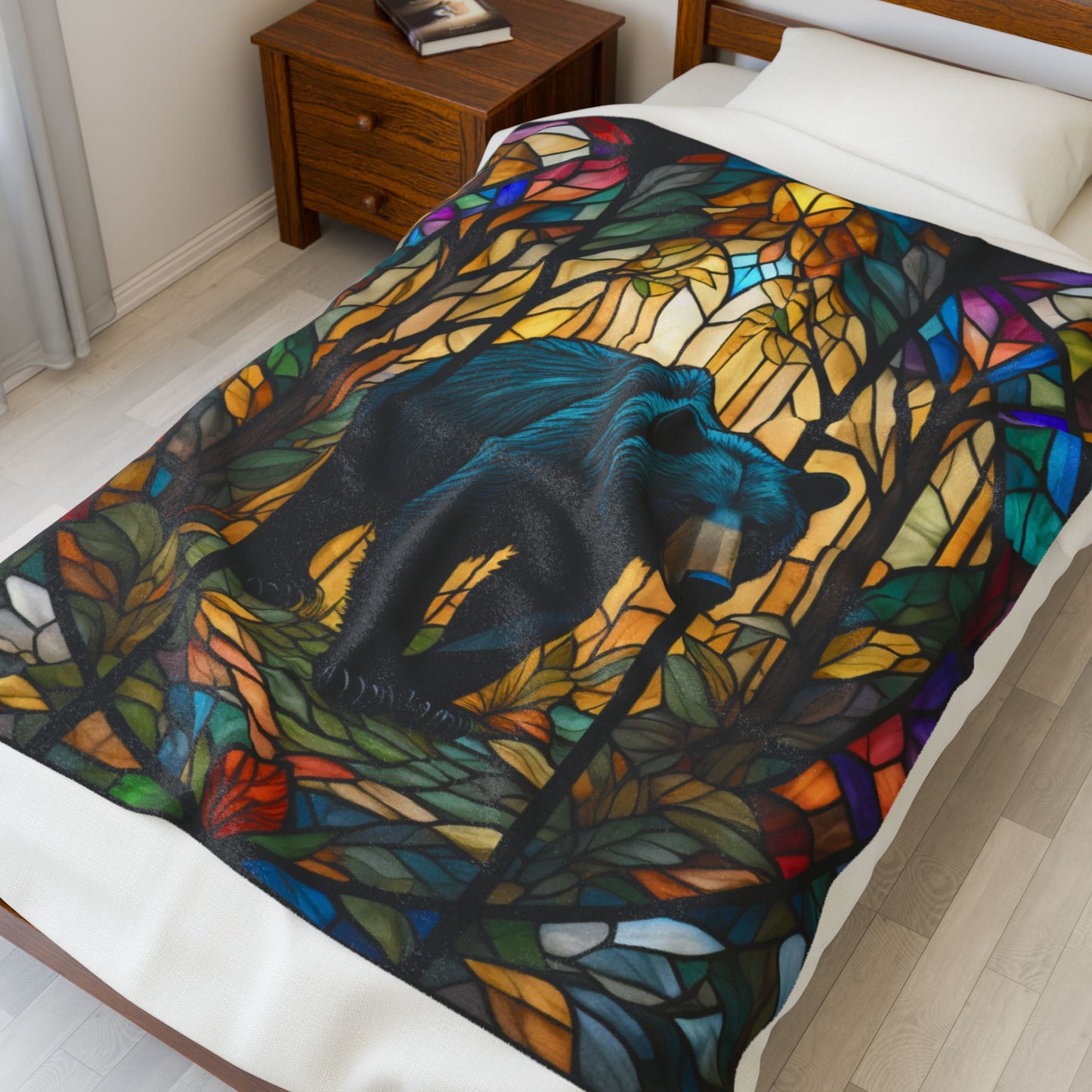 A cozy stained glass bear blanket featuring vibrant wildlife art for warmth and relaxation.