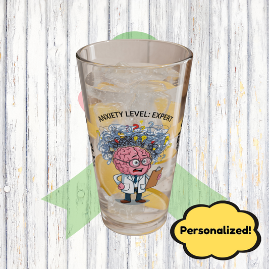 "Anxiety Level: Expert" personalized pint glass with attitude, offering daily humor and self-care.