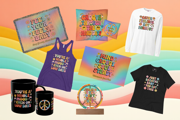 Collection of colorful clothing and home decor items with motivational phrases on a rainbow gradient background.