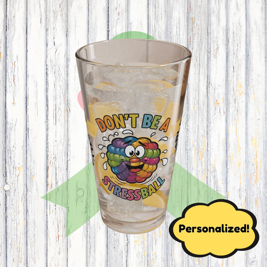 "Don’t Be A Stressball" personalized funny pint glass with sassy attitude and humor for stress relief.